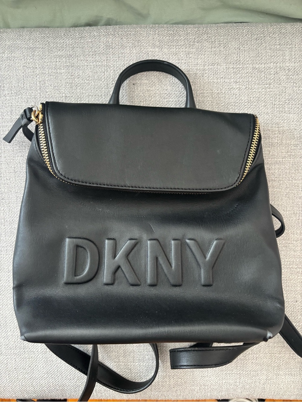 DKNY Black Leather Logo Backpack with Gold Zipper Accents
